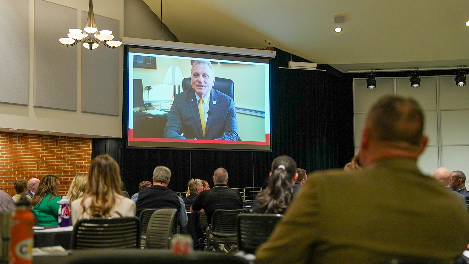 The University of Georgia recently hosted the Southeastern Defense Communities Workshop in Athens. The event brought together military personnel, resilience experts and researchers from across the southeast to discuss solutions to strengthen military installations and their surrounding communities. Above, Rep. Buddy Carter (GA-01), gives a welcome via video. At top, Rachel Jacobson, assistant secretary of the Army for Installations, Energy and Environment, gives the keynote address.