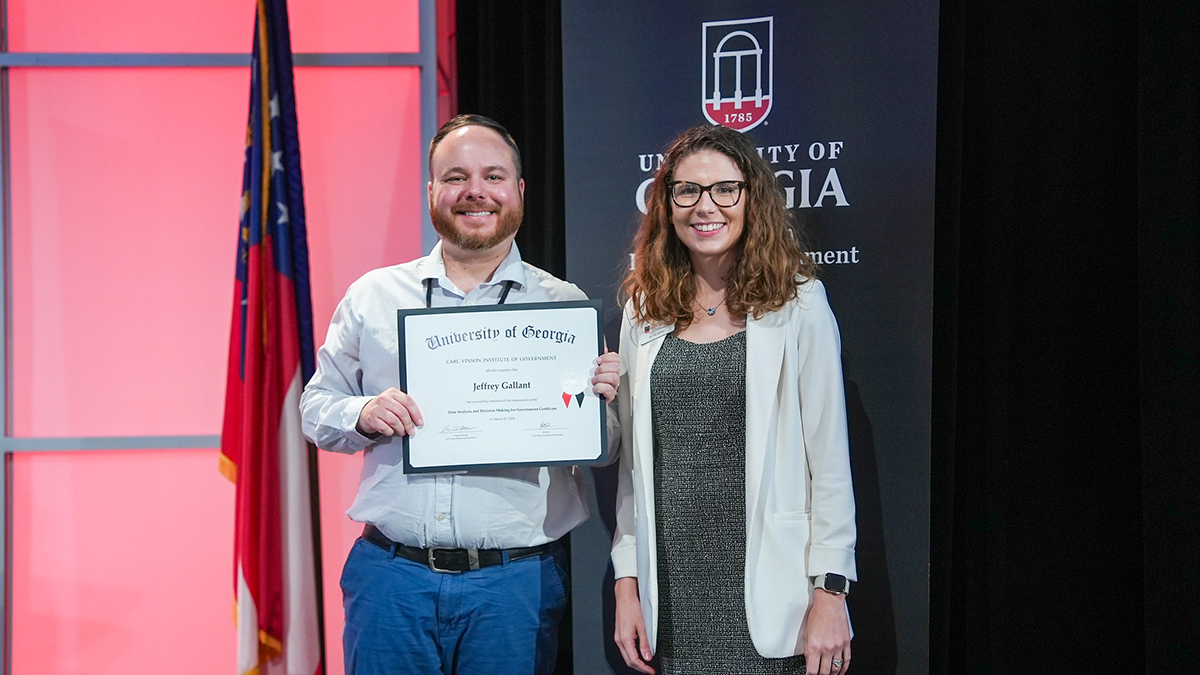 Jeff Gallant, program director for the University System of Georgia’s Affordable Learning Georgia program, poses with Anna Miller, faculty member at the UGA Institute of Government, at the Data Analysis and Decision Making for Government certificate program graduation.