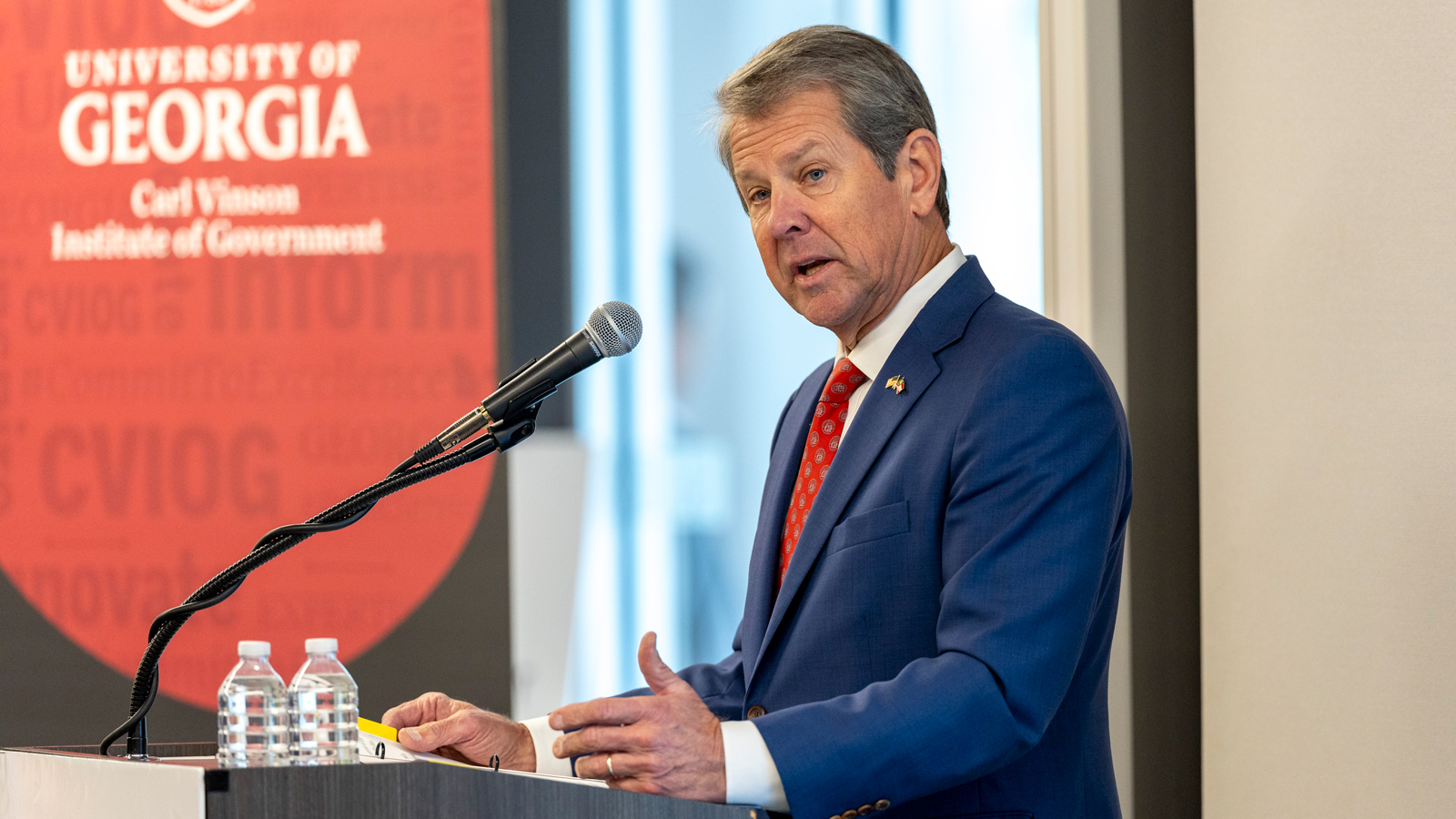 Gov. Brian Kemp speaks during the closing luncheon for the Institute of Government Workforce Development Conference.