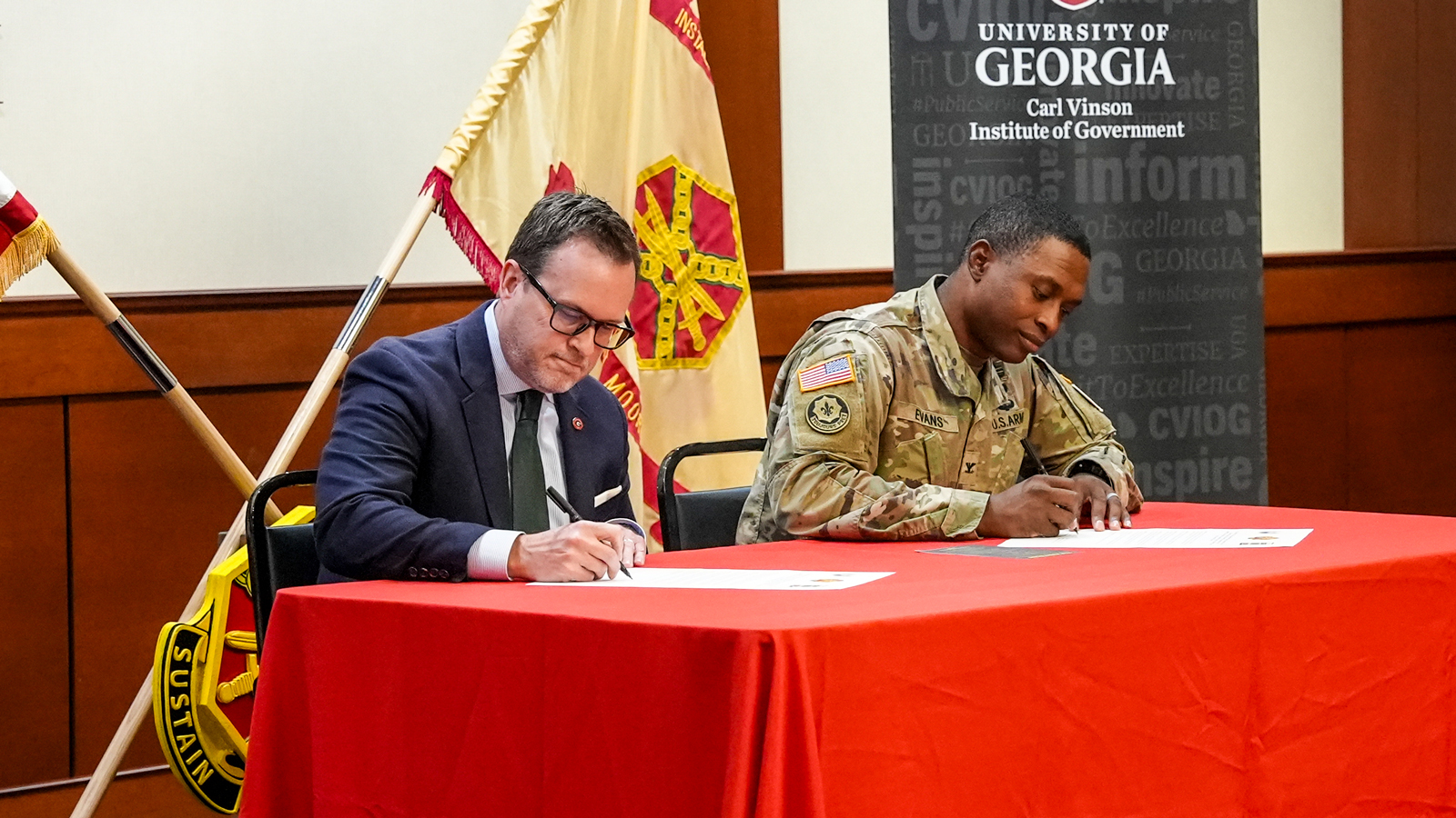 UGA Institute of Government Director Rob Gordon (left) and Fort Moore Garrison Commander Col. Jerel Evans signed a new intergovernmental support agreement (IGSA) between the UGA and the U.S. Army in November. The agreement solidifies an innovative partnership designed to enhance the resilience of military installations through the Defense Communities Resilience Program. 