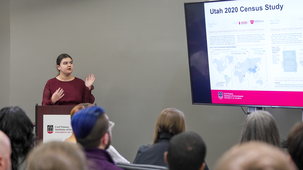 UGA student and Vinson Fellow Emma Mineva discusses US Census data during her presentation on Middle Eastern and North African populations at the UGA Institute of Government.