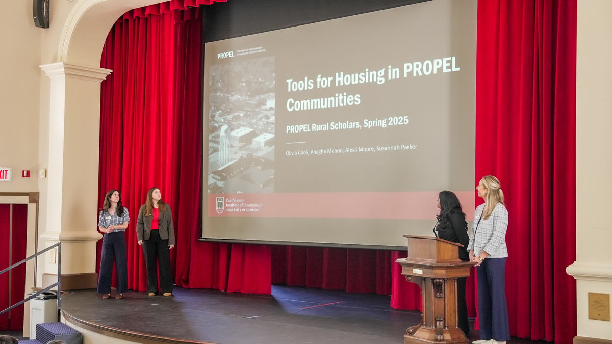 PROPEL Rural Scholars presented their final projects at the UGA Carl Vinson Institute of Government. From left to right, Susannah Parker, Alexa Moore, Anagha Menon and Olivia Cook. 