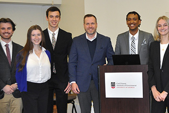 Four University of Georgia undergraduate students selected for the Vinson Fellows Program recently presented their findings from their semester-long research projects to Institute of Government faculty and staff.