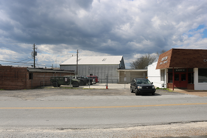 A parking lot provides a blank canvas for potential redevelopment. 