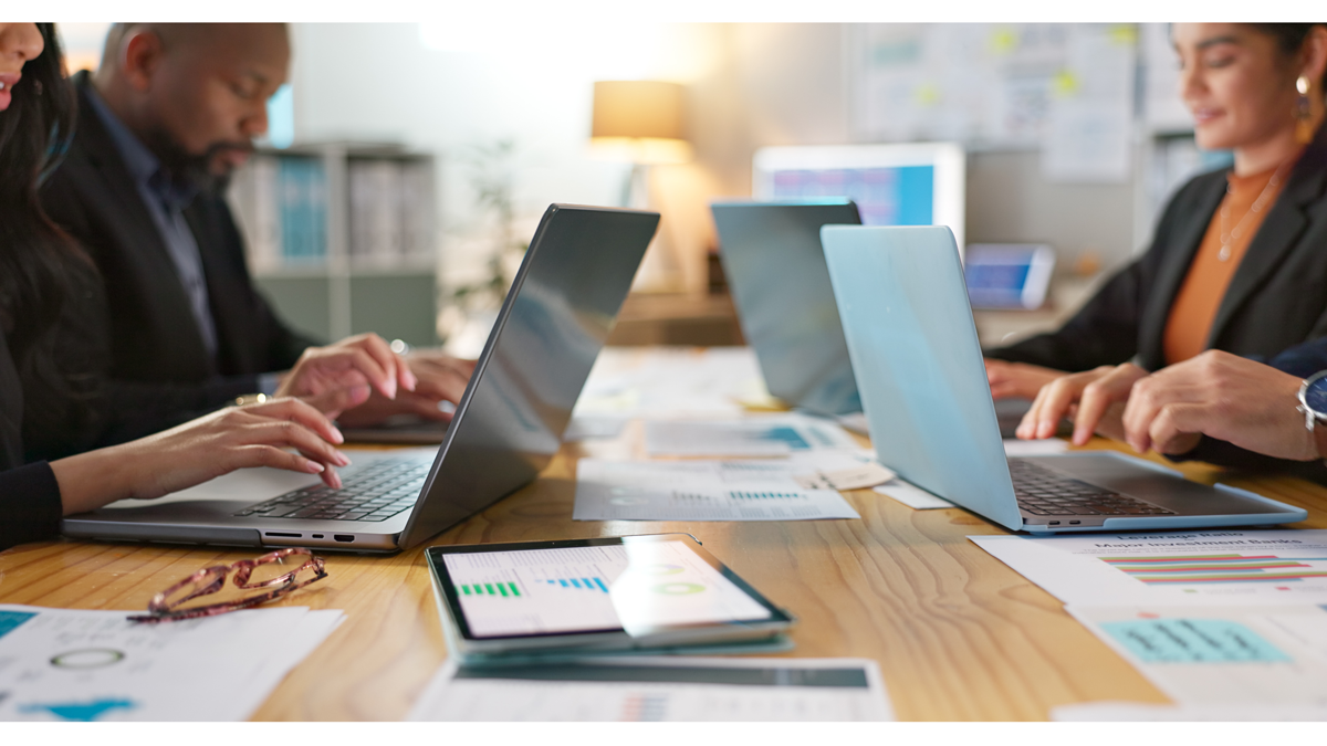 picture of people sitting at computers.